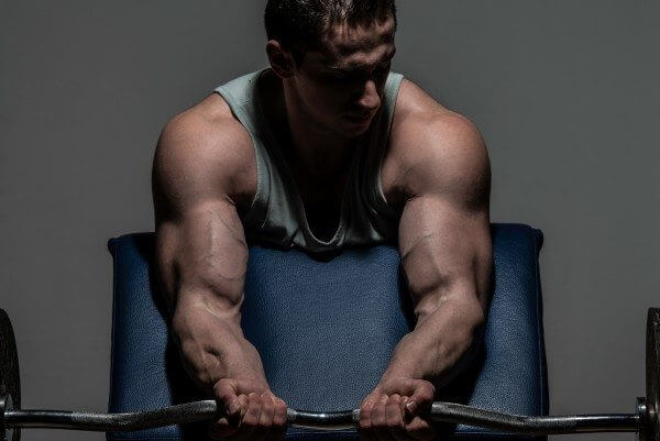 Preacher curls are a great exercise for building your arm muscles.